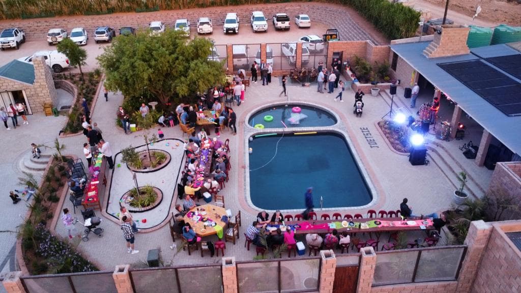 Elegant outdoor event venue and seating arrangement at Joetsie Lodge